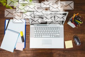 Envelopes shown over laptop